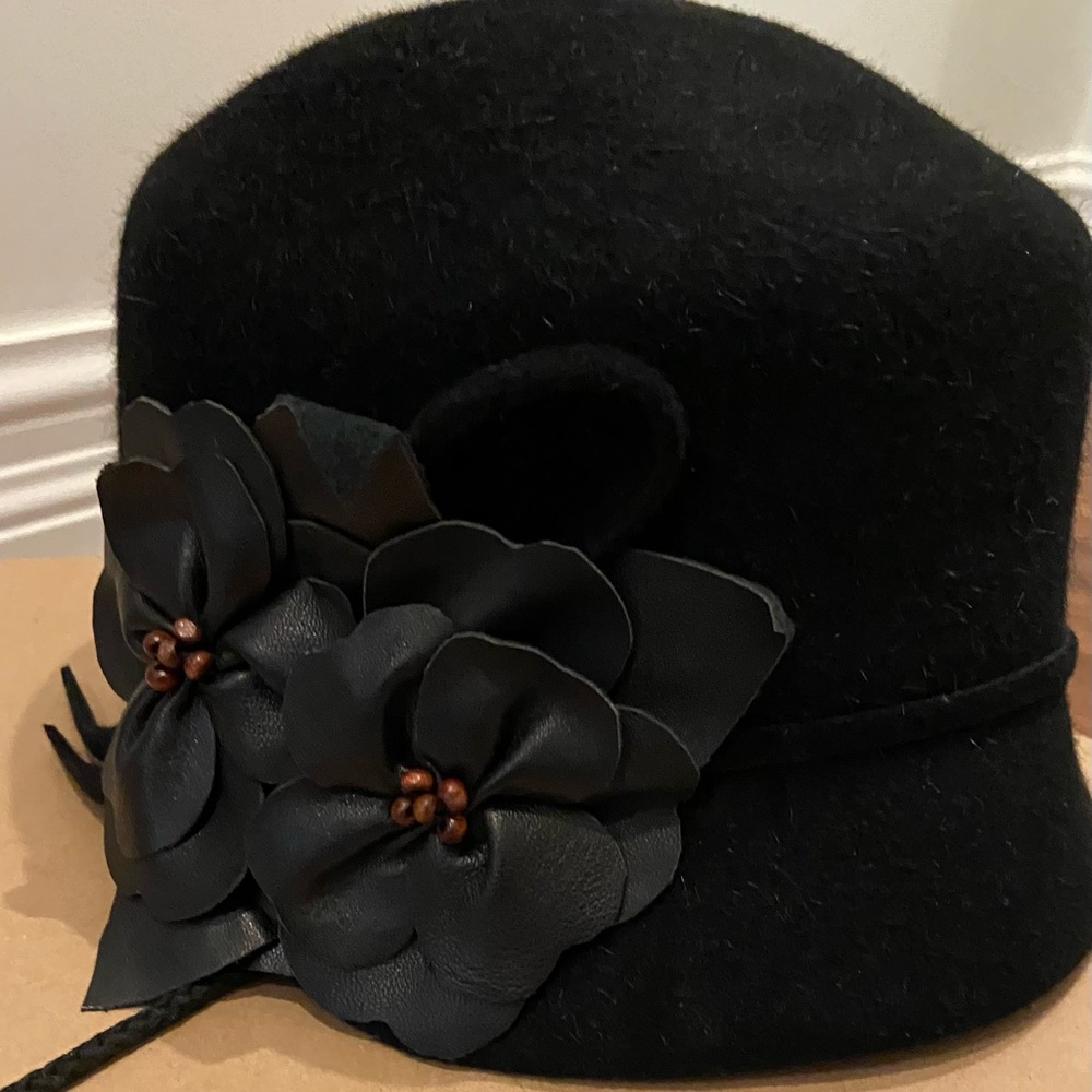 Black felt hat with leather floral detail